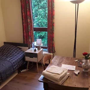 Habitación en casa particular Chez Mimi - Vue Parc